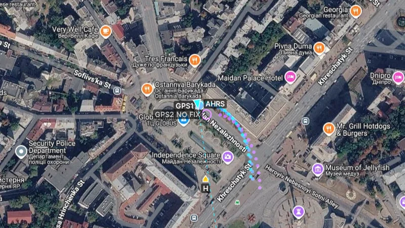 Groundpost map tab: cyan AHRS arrow with a cyan breadcrumb trail, blue GPS1 circle with a blue trail, and a hollow violet GPS2 ring labelled GPS2 NO FIX at the end of a violet trail that stopped when the receiver lost its fix
